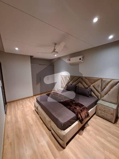 2 Bedroom Luxury Apartments For Rent In Gulberg Lahore Drawing Dining TV Lounge