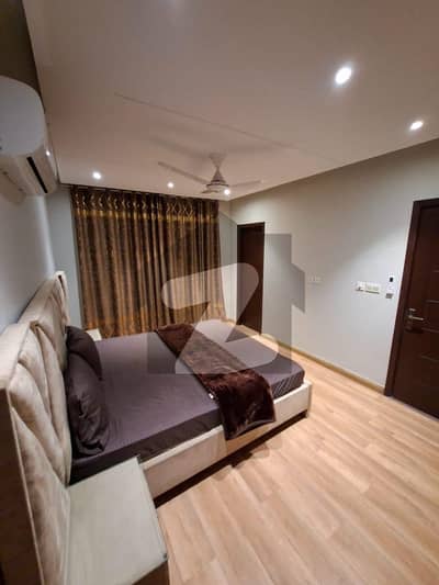Luxury building luxury 2bed room apartment for sale drowning dining tv lounge in main Gulberg Lahore
