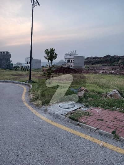 5 Marla Plot for Sale in Sector N, Bahria Enclave Islamabad Possession utility charges paid. . . Front open. . . street. . . . 18