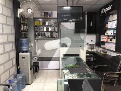 Running Commercial Mobile Shop For Sale Imperial Market, Raja Bazar, Rawalpindi Monthly Rent Rs. 55,000/-