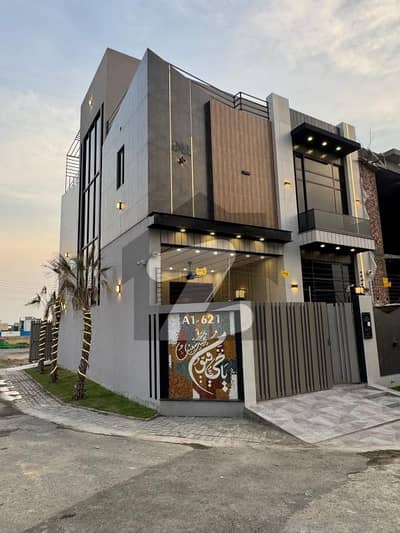 5 Marla Corner Stunning ultra modren design house for sale Top offf the line House best and Solid Construction All facilities available near too lGs and Naqas Sachool. . .