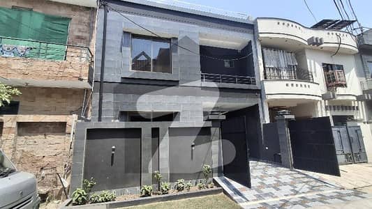 Centrally Located House In Wapda Town Is Available For Sale