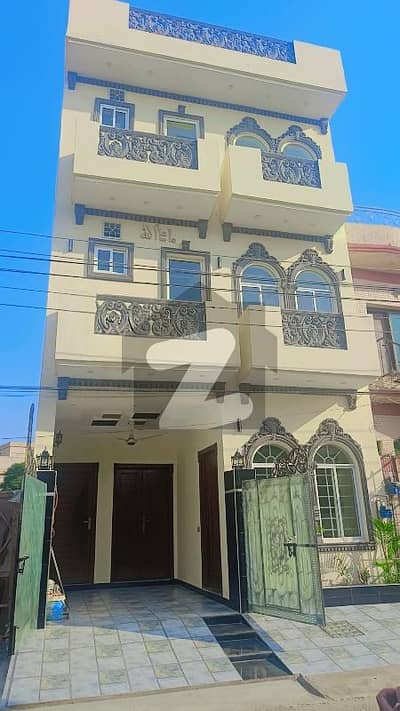 4 Marla (Brand New) Triple Story House For Sale. . Near to Emporium Mall