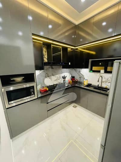 Contemporary House for Sale in DHA Phase 9 Town 3 Bedrooms, Double Kitchen & Servant Quarte