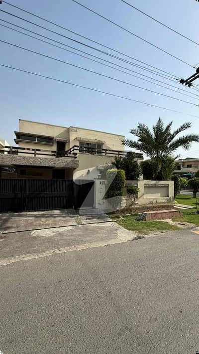21 MARLA ELEGANT CORNER OLD BUNGALOW WITH BASEMENT AND BIG LAWN IS AVAILABLE IN THE BEST BLOCK OF DHA LAHORE.