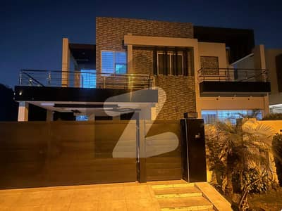 1 KANAL ELEGANT AND FULLY MAINTAINED SUPER HOT LOCATED BUNGALOW IS AVAILABLE IN THE BEST BLOCK OF DHA LAHORE