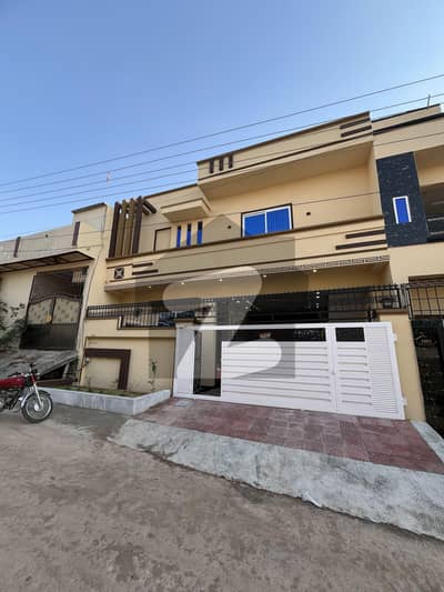 Brand New 6 Marla 1.5 Story House for Sale 3 Bed, 2 Kitchens Big 2-Car Parking Porch.