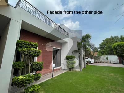 SYED BROTHERS PROUDLY OFFERS: 2-Kanal Elegant Duplex Double Unit Bungalow Is Available In The Best Block Of DHA Lahore.
