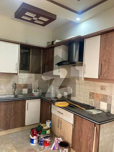 2 Bed D/D 1st Floor Commercial Leased Flat For Sale At Karachi University Society Near By State Bank Society Sector 18A Scheme 33 Karachi.