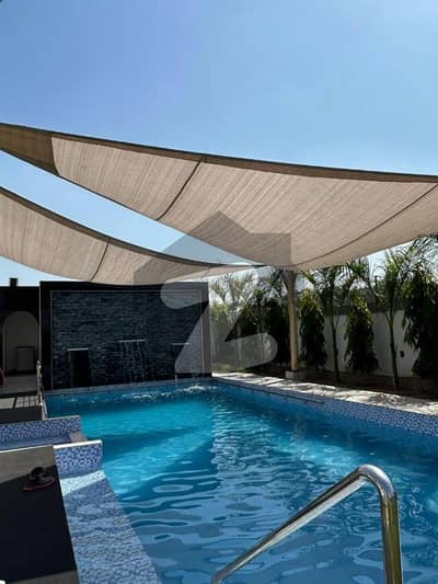 PREMIUM 4-KANAL LUXURY FARMHOUSE FOR RENT, Prime Location: Barki Road (Conveniently located near DHA Phase 7 & Defence Raya)