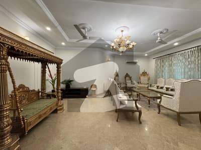 F8 1066 SQUARE YARD LUXURIOUS FURNISHED TRIPLE STORY 2 KANAL HOUSE 10 BEDROOMS BEAUTIFUL GREEN LAWN EXCELLENT LOCATION MODERN FITTING SPECIOUS WASHROOMS DOUBLE KITCHEN DINING DRAWING 2 TV L BEAUTIFUL TERRACE 3 SERVANT QUARTER MASTER BED ROOMS