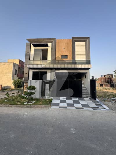 5 marla beautiful corner ultra modern house for sale in Al haram garden near central park housing society Lahore