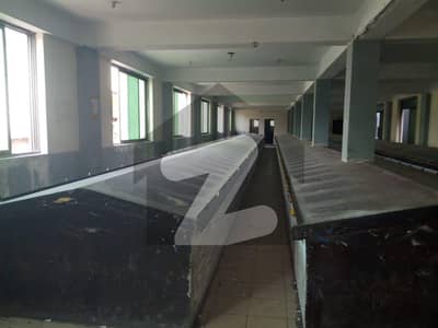 Commercial Space With Concrete Built Textile Printing Tables In 1st Floor & A Multi-Purpose Hall On The 2nd Floor.