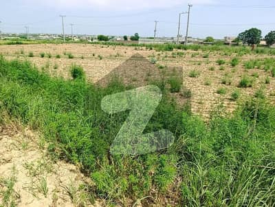 7 Marla Short Corner Plot Double Road Back