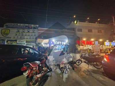 Gulshan e Iqbal block 5 main road shop for sale with healthy rental income leased shop