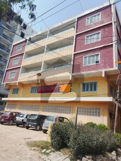 Shahraefaisal adjacent Shahidemillat road Baloch pull By birth commercial building on Rent