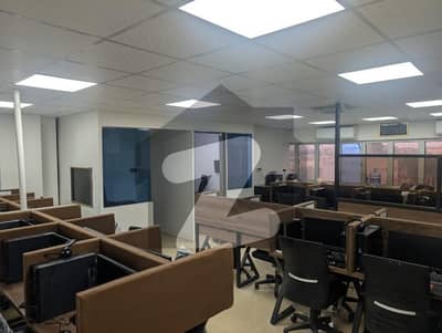 semi furnished office available for rent at main shahra e faisal