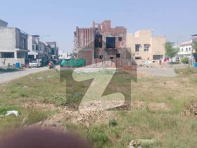 5 marla Residential plot in DHA 9 town sector D   Features:-  Nearby Masjid  Nearby Park  Easy Approach