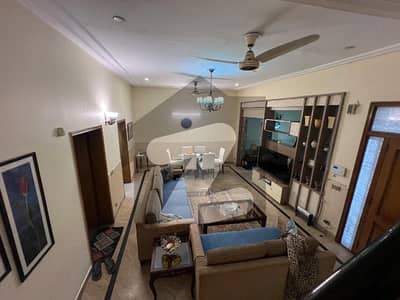 5 Marla house for sale in Johar town block A2 Facing park (original photo) Tile flooring Hot location Main apporched