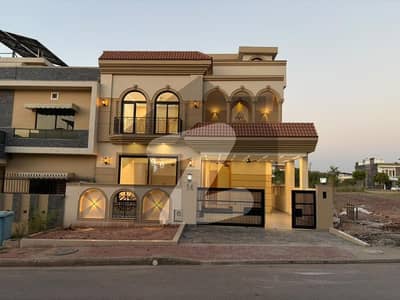 Brand new 10 marla luxury designer house avaliable for sale 5 bed accommodation 2 American kitchen 1 Servent two species TV lounge.  Available in Bahria Enclave Islamabad