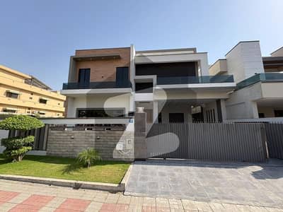 1 Kanal Designer House with Double Height Lobby & Magnificent Glass Terrace