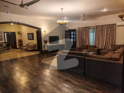For sale 1.5 kanal 7 bedroom house in main Bani Gala Bazaar Islamabad