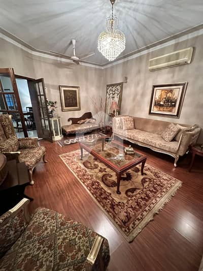 One Kanal Used Modern Design Bungalow For Sale At Prime Location Of DHA Lahore Near To Park Masjid & Commercial Market.