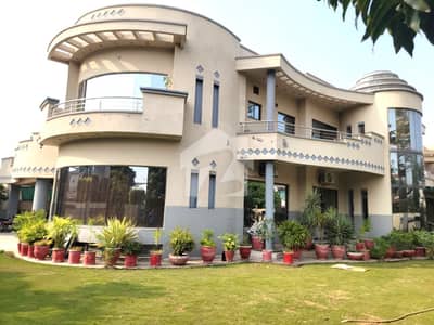 2 Kanal Slightly Used Well Maintained 6-Bed Modern Design Most Beautiful Full Basement Swimming Pool Bungalow For Sale At Prime Location Of DHA Lahore Near To Park Masjid & Commercial Market .