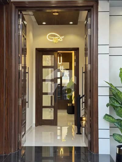 5-Marla Modern Elegance for Rent in DHA Phase 9 Town 4 Master Bedrooms, Attached Baths, Marble Flooring, Spacious Drawing & Dining, Modern Company Kitchen, TV Lounges, Prime Location, 1-Car Parking Easy Deal with Motivated Seller!