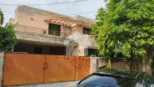 20-Marla Bungalow For Sale At Prime Location Of DHA Lahore Near To Park, Masjid And Commercial Market.