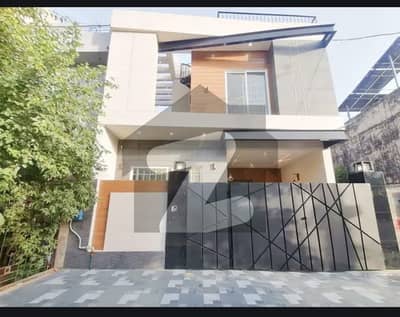 7.5 Marla Brand New Luxury Modern Style Triple Storey Super Hot Location 65 Feet Road With Direct Owner Available For Sale in Johar Town Phase 2 Near Emporium Mall.