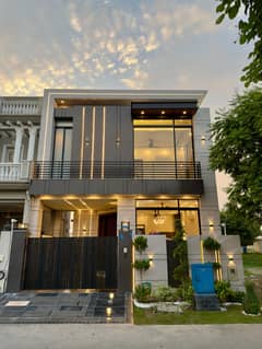 5 Marla Brand New Ultra Modern House Available In DHA 9 Town Best For Investment & Family Living