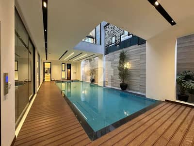 Luxurious 1 Kanal Dream Home With Private Pool In DHA 2 Prime Location Near McDonalds!