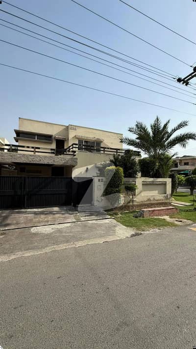 21 MARLA ELEGANT CORNER OLD BUNGALOW WITH BASEMENT AND BIG LAWN IS AVAILABLE IN THE BEST BLOCK OF DHA LAHORE.