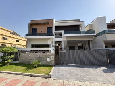 1 Kanal Designer House with Double Height Lobby & Magnificent Glass Terrace