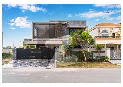 One Kanal Brand New Luxury Ultra-Modern Design Only 6 Month Use Most Beautiful Fully Furnished Bungalow 2 Servant Quarter In Basement For Sale At Prime Location Of DHA Lahore Near To Park Masjid & Commercial Market.