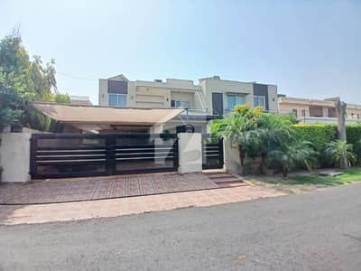 2 Kanal Slightly Used Luxury Ultra-Modern Design Most Beautiful Bungalow For Sale At Prime Location Of DHA Lahore Near To Park Masjid & Commercial Market .