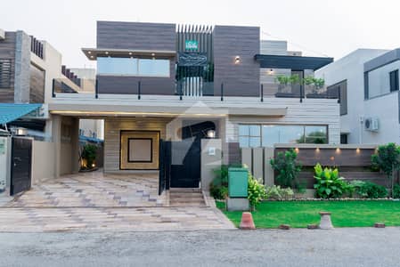 D H A Lahore 1 Kanal Brand New Mazhar Munir Design House With 100% Original Pics Available For Rent