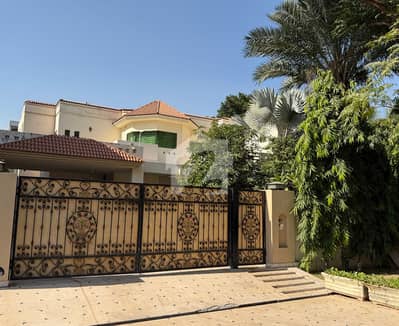 34 Marla Slightly Used Spanish Design 7-Bed Room Facing Park Bungalow For Sale At Prime Location Of DHA Lahore Near To Park Masjid & Commercial Market.
