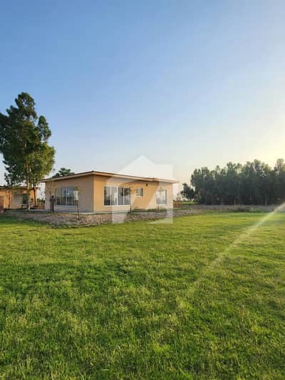 "Impeccable 4-Kanal Entertainment-Ready Farmhouse With Pool And Scenic Beauty In DHA Phase 10, Easy Deal With EMPIRE Estate"
