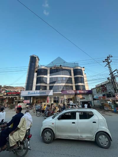 SHOP FOR RENT ADYALA TOWER, Rawalpindi. Ideal For Pharmacy, Clinic, Or Retail. Spacious Shop With Glass Door, Bright Lighting, On Main Road With Parking. CCTV-Enabled, Rs. 20,000/Month.