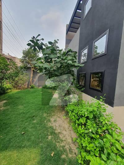 20 Marla House For Sale In Raza Town Canal Road Faisalabad.