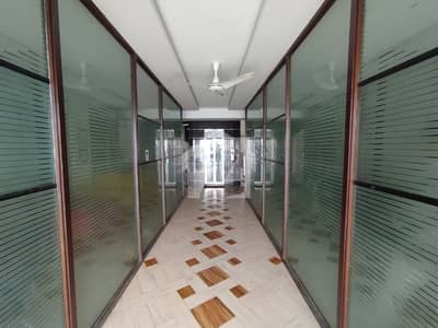 BUILDING FOR RENT Main Muslim Commercial With Basement And 1st,2nd,3rd,4th Floor Glass Elevation With Lift