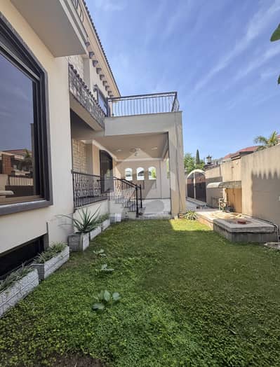 F10 EXCELLENT NEW HOUSE TRIPLE STOREY WITH OPEN BASEMENT BEAUTIFUL GREEN LAWN TOP LOCATION SPECIOUS WASHROOMS TWO MAIN GATES CLOSE END STREET