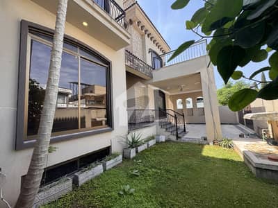 F10 EXCELLENT NEW HOUSE TRIPLE STOREY WITH OPEN BASEMENT BEAUTIFUL GREEN LAWN TOP LOCATION SPECIOUS WASHROOMS TWO MAIN GATES CLOSE END STREET