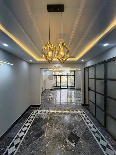 Brand New Luxury Villa in F-11 with Spacious Lawn and Parking - Perfect for Modern Living.
