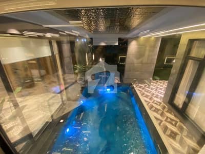 2 KANAL BRAND NEW DESIGNER HOUSE FOR SALE WITH SWIMMING POOL.