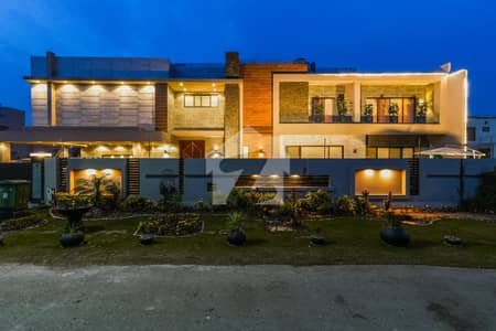 2 Kanal Ultra-Modern Mansion on 100ft Road | With Lift, Pool & Cinema with Rooftop Garden & Solar & Private Office A Rare Gem in the Current Market!