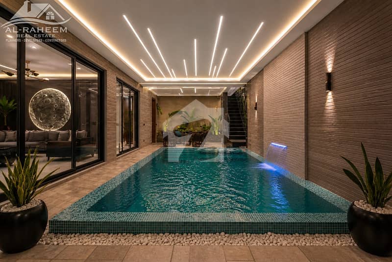 INDOOR INFINITY SWIMMING POOL 1 KANAL FULLY FURNISHED ULTRA MODERN BUNGALOW FOR SALE IN PHASE 7 NEAR TO RAYA. INDOOR INFINITY SWIMMING POOL 1 KANAL FULLY FURNISHED ULTRA MODERN BUNGALOW FOR SALE IN PHASE 7 NEAR TO RAYA.