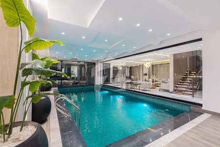 KANAL Bungalow AND KANAL LAWN MODERN INDOOR POOL AND HOUSE For Sale In RAYA GOLF